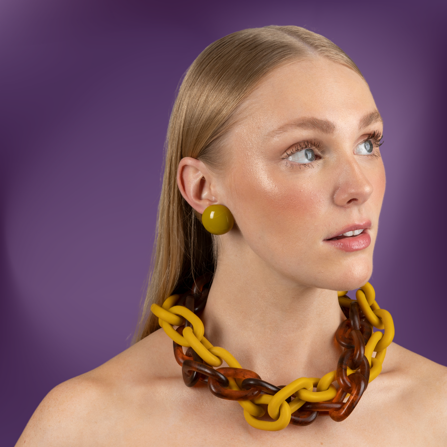 model-wearing-ana-harris-store-maxi-button-earrings-mustard